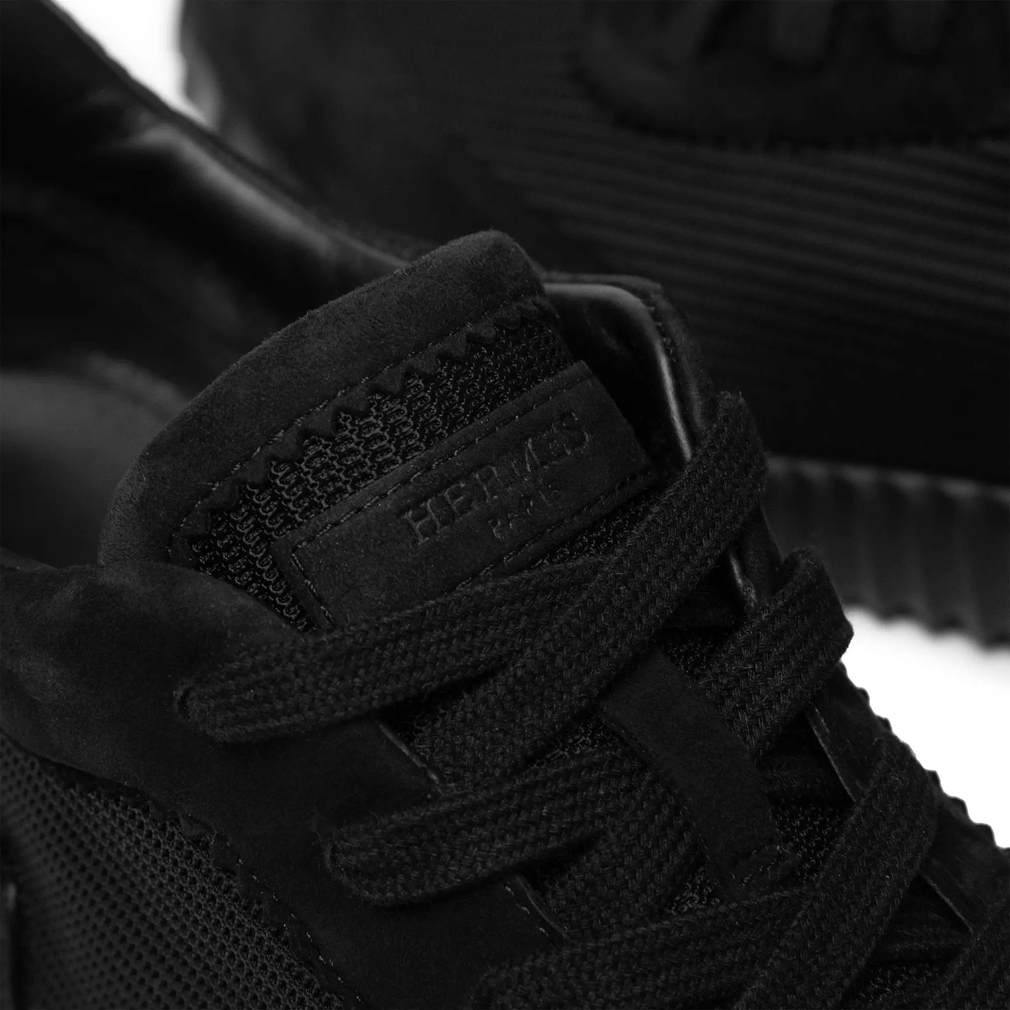 Tongue View of Hermès Paris Bouncing Sneaker Triple Black
